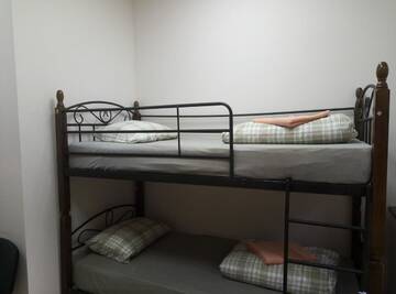 Кровать в общем 6-местном номере в  Minsk City Hostel (Минск Сити Хостел)